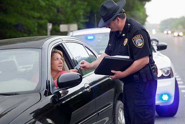 Why Do Cops Touch the Back of Car When They Pull You Over?